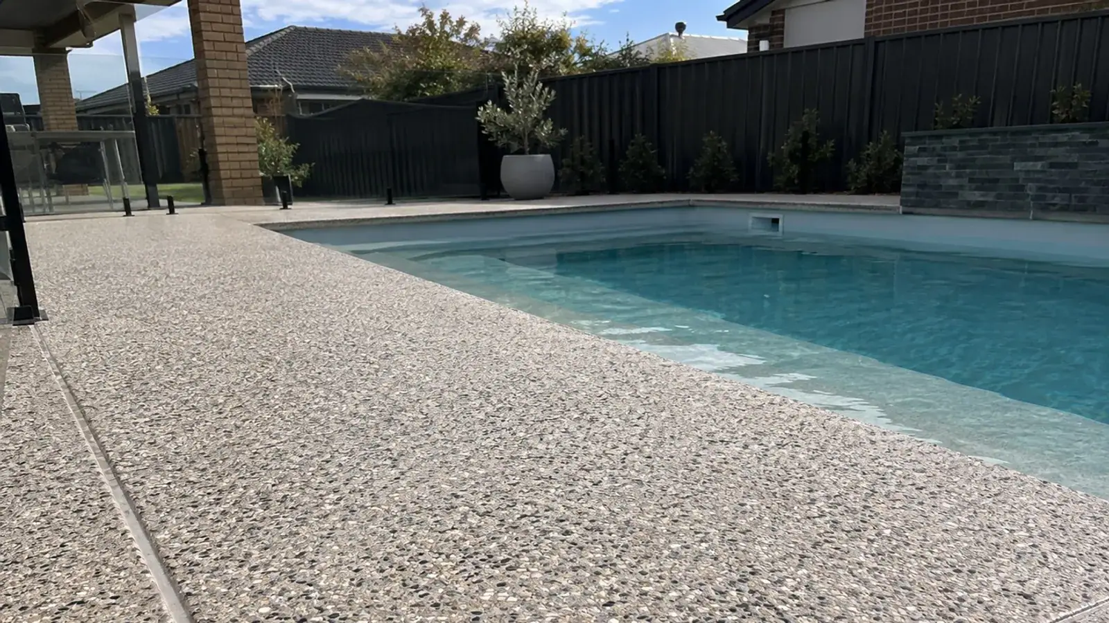 Concrete pool surround with a non-slip finish in Bendigo