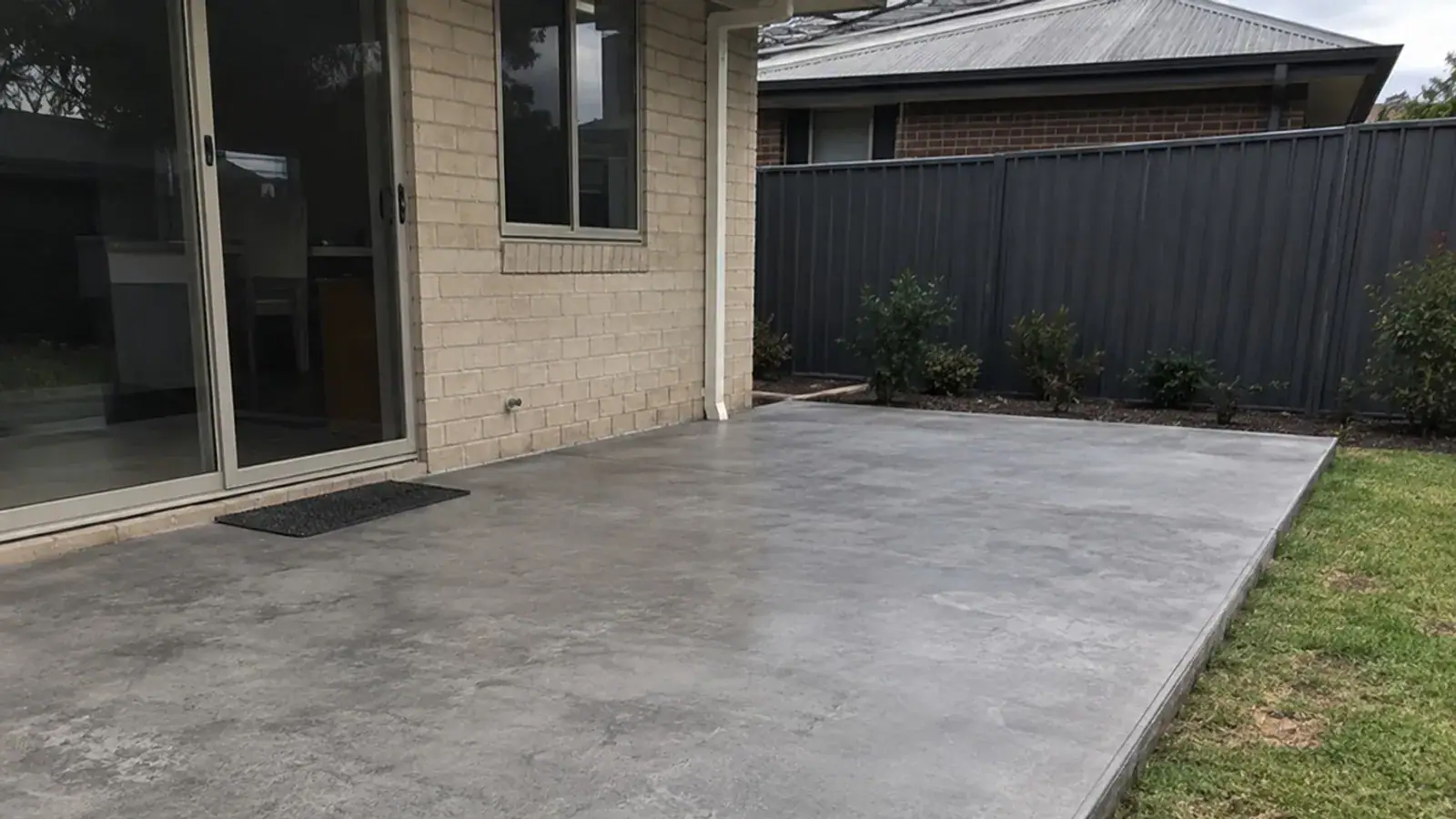 Honed concrete floor with a soft matte finish in Bendigo